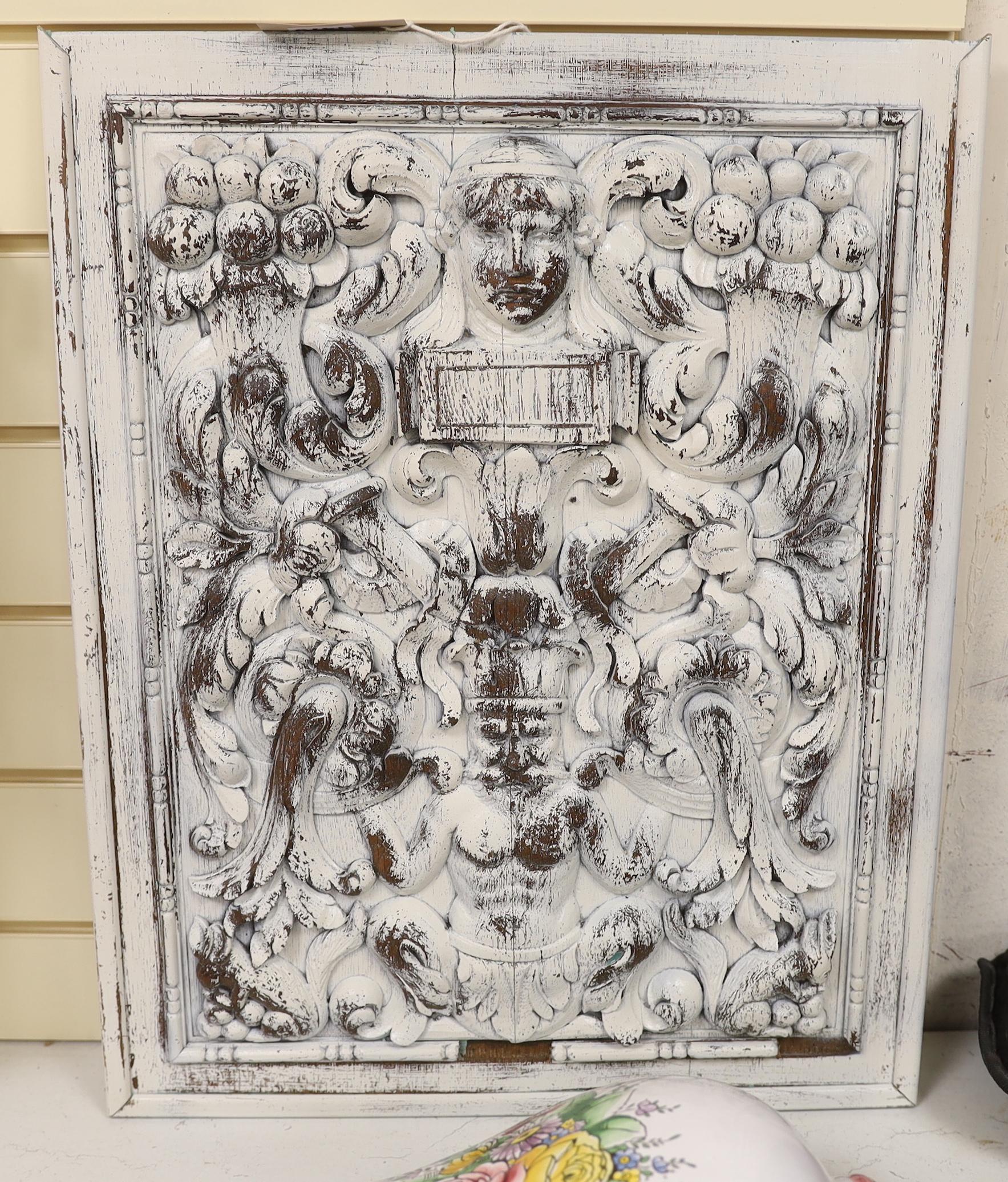 A Flemish style painted carved oak panel with figures, 60 x 42cm